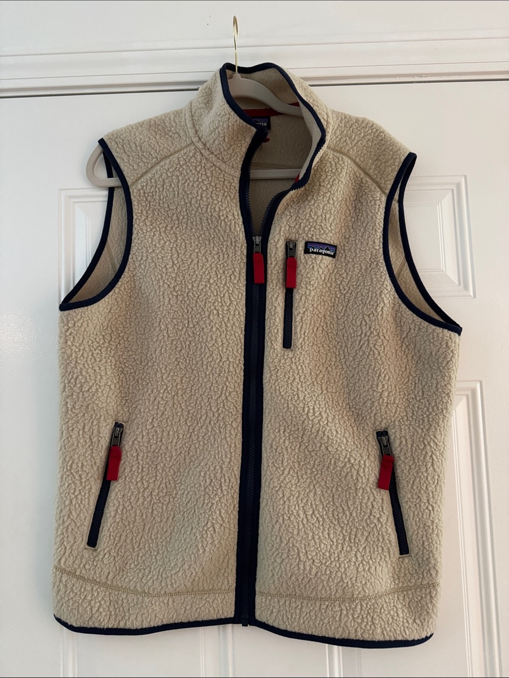 Patagonia Cream Sherpa Vest with Navy Trim and Red Accents